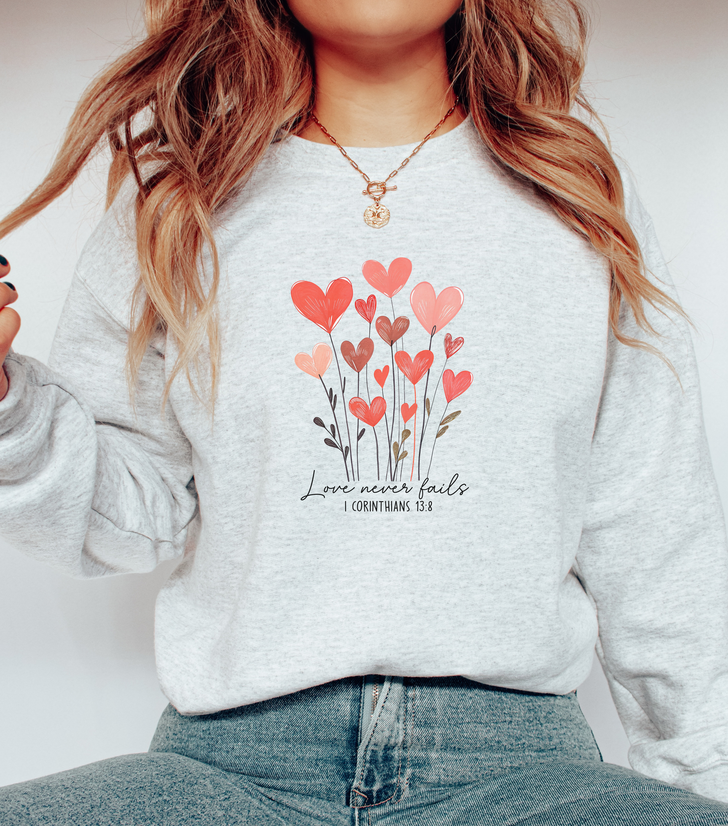 Love Never Fails Sweatshirt