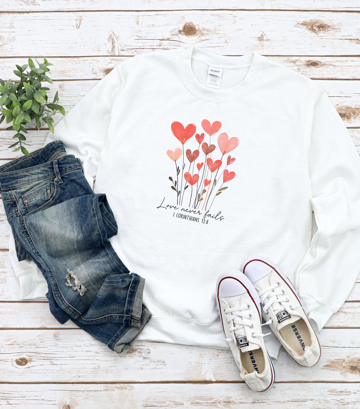 Love Never Fails Sweatshirt